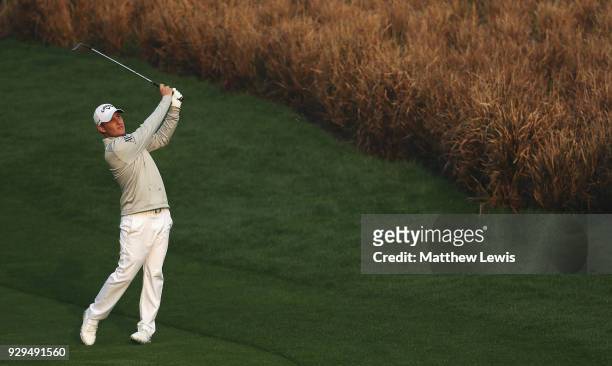 Emiliano Grillo of Argentina plays a shot from the 11th fairway during day two of the Hero Indian Open at Dlf Golf and Country Club on March 9, 2018...