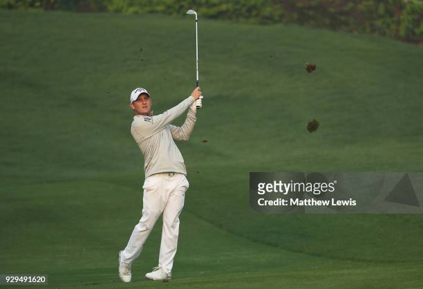 Emiliano Grillo of Argentina plays a shot from the 10th fairway during day two of the Hero Indian Open at Dlf Golf and Country Club on March 9, 2018...