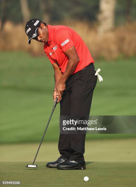 Chawrasia of India makes a putt on the 12th green during day two of the Hero Indian Open at Dlf Golf and Country Club on March 9, 2018 in New Delhi,...
