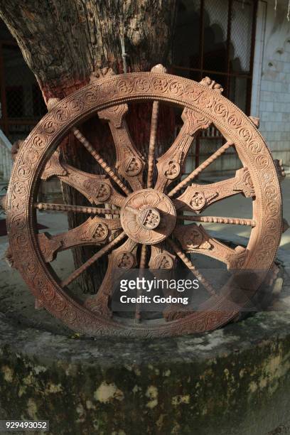 Dharma wheel in Raman Reti hindu temple. India.