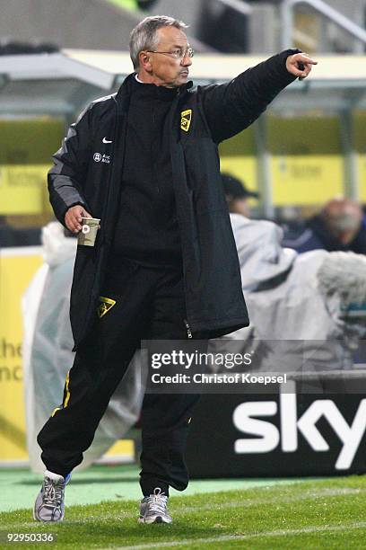 Head coach Michael Krueger of Aachen issues instructions to the team during the second Bundesliga match between Alemannia Aachen and Hansa Rostock at...