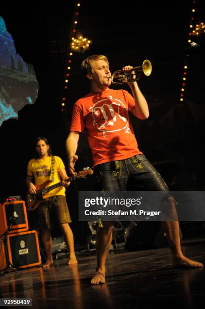 Oliver Wrage and Stefan Dettl of La Brass Banda perform on stage at Circus Krone on November 7, 2009 in Munich, Germany.