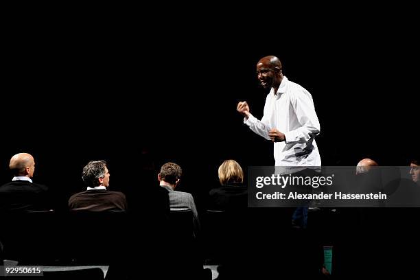 Actor Mlamly of South Africa performs during the presentation of the new German FIFA World Cup 2010 kit at the adidas Brand Center on November 10,...