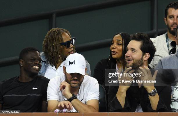 Alexis Ohanian, co-founder and executive chairman of the social news website Reddit cheers for his wife Serena Williams as she battles against Zarina...