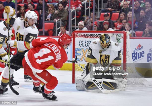 Detroit Red Wings Center Luke Glendening with a shot attempt against Vegas Golden Knights Goalie Marc-Andre Fleury in the NHL hockey game between Las...