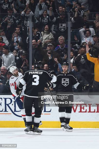 Trevor Lewis of the Los Angeles Kings celebrates with Dion Phaneuf after scoring a goal against the Washington Capitals at STAPLES Center on March 8,...