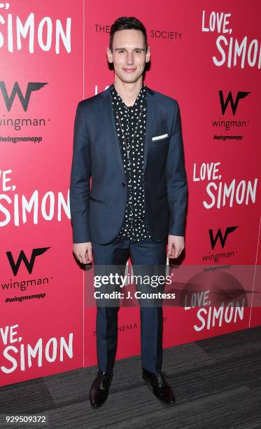 Actor Cory Michael Smith poses for a photo at the screening of "Love, Simon" hosted by 20th Century Fox & Wingman at The Landmark at 57 West on March...