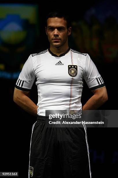 Model presents the new German FIFA World Cup 2010 jersey 'Teamgeist' at the adidas Brand Center on November 10, 2009 in Herzogenaurach, Germany.