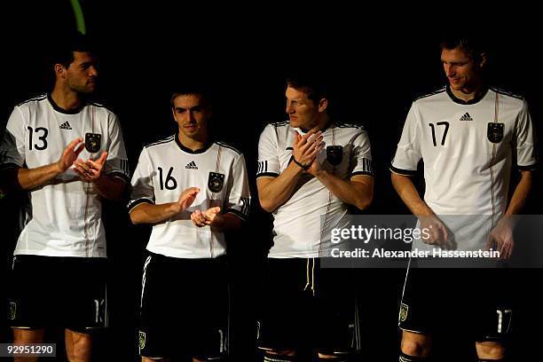 Michael Ballack, Philipp Lahm, Bastian Schweinsteiger and Per Mertesacker present the new German FIFA World Cup 2010 jersey 'Teamgeist' at the adidas...