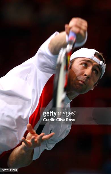 Benjamin Becker of Germany serves during his first round match against Nikolay Davydenko of Russia during the ATP Masters Series at the Palais...