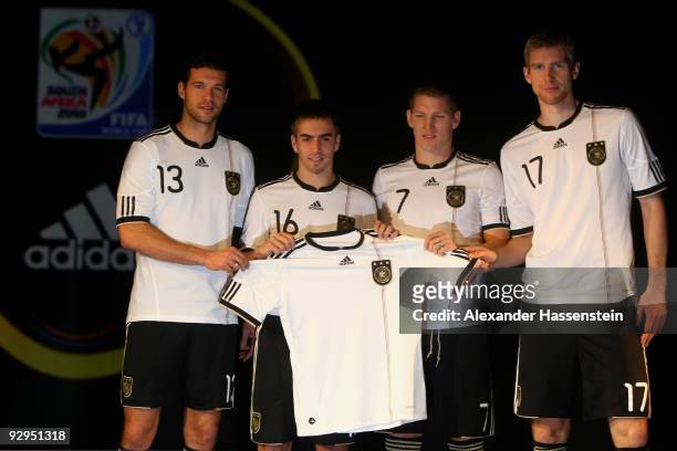 Michael Ballack, Philipp Lahm, Bastian Schweinsteiger and Per Mertesacker present the new German FIFA World Cup 2010 jersey 'Teamgeist' at the adidas...