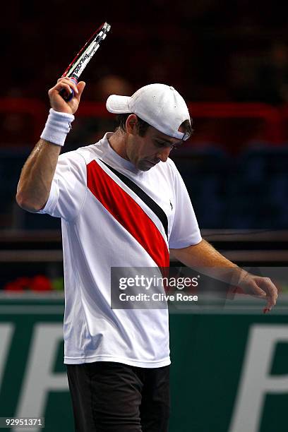 Benjamin Becker of Germany reacts after a bad point during his first round match against Nikolay Davydenko of Russia during the ATP Masters Series at...