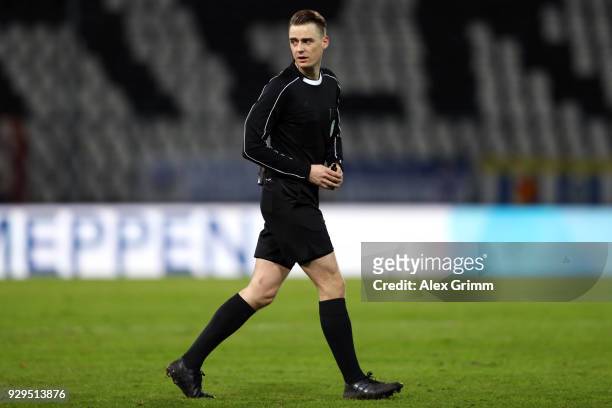 Referee Steffen Bruetting reacts during the 3. Liga match between Karlsruher SC and SG Sonnenhof Grossaspach at on March 07, 2018 in Karlsruhe,...