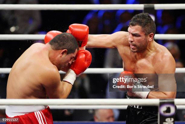 Adnan Serin of Germany and John Ruiz of the USA compete during their heavyweight fight at the Arena Nuernberger Versicherung on November 7, 2009 in...