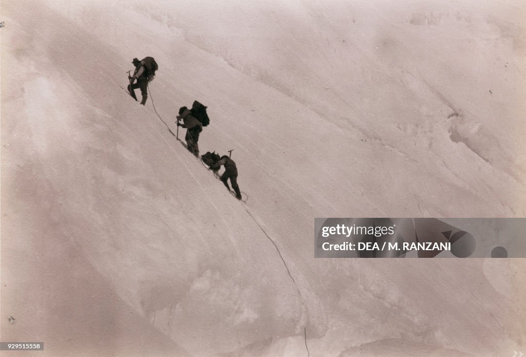 Roped party climbing glaciers of Mount Saint Elias