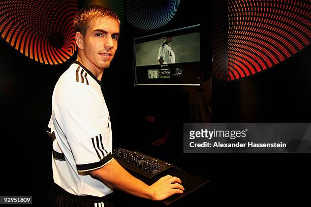 Philipp Lahm poses after the presentation of the new German FIFA World Cup 2010 jersey 'Teamgeist' at the adidas Brand Center on November 10, 2009 in...