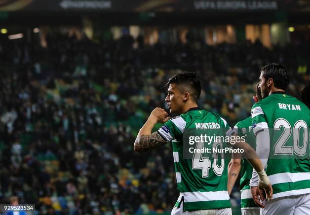 Sporting's Colombian forward Fredy Montero celebrates a goal with Sporting's Costa Rican forward Bryan Ruizduring the UEFA Europa League round of 16...