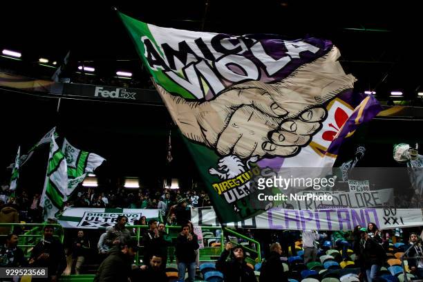 Sporting supporters wave charts during the UEFA Europa League round of 16 match between Sporting CP and Viktoria Plzen at Jose Alvalade Stadium in...