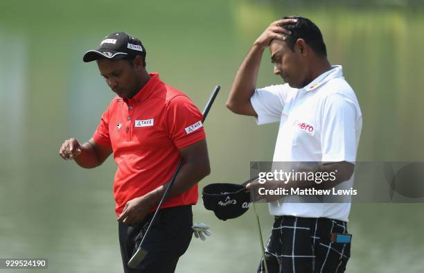 Chawrasia and Anirban Lahiri of India look on, after their round during day two of the Hero Indian Open at Dlf Golf and Country Club on March 9, 2018...