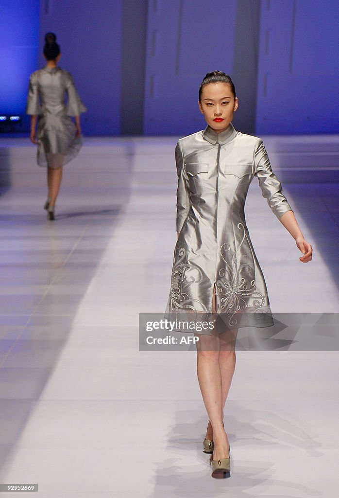 A model showcases a creation from a youn