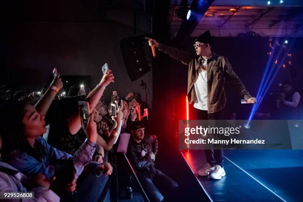 Bad Bunny performs on stage at Apple Music Celebrates 'Up Next' Artist Bad Bunny with a concert for fans at Bar 1306 in Miami, Florida on March 8,...