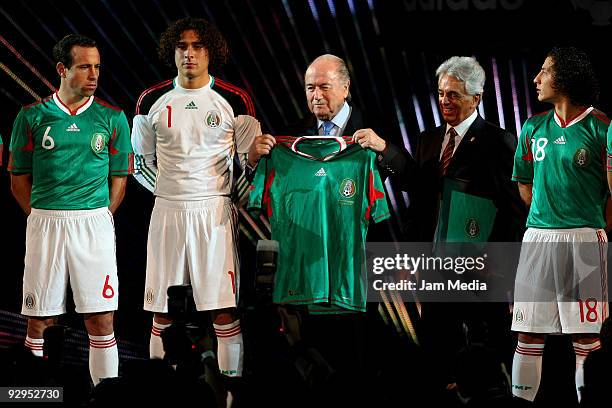 President Joseph Blatter Justino Compean president of Mexican Federation and Mexico's players Gerardo Torrado Guillermo Ochoa and Andres Guardado...