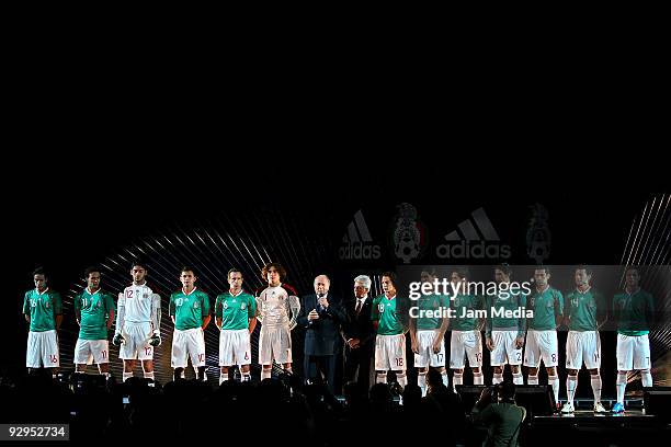 President Joseph Blatter Justino Compean president of Mexican Federation and Mexico's players during the presentation of the new T-shirt of the...