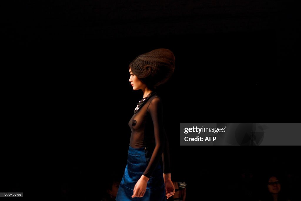 A model showcases a creation from a youn