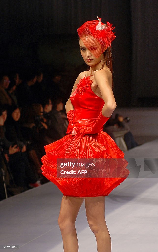 A model showcases a creation from a youn