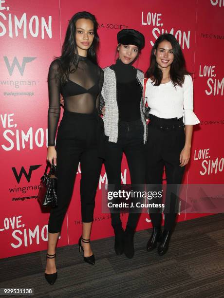 Models Thais Martins, Melissa Martinez and Noria Neuva pose for a photo at the screening of "Love, Simon" hosted by 20th Century Fox & Wingman at The...