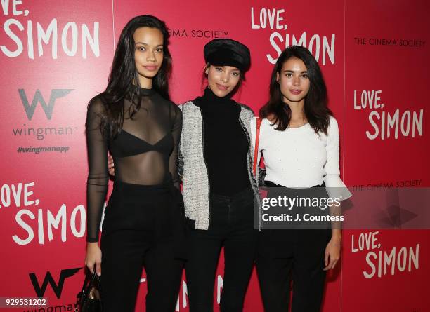 Models Thais Martins, Melissa Martinez and Noria Neuva pose for a photo at the screening of "Love, Simon" hosted by 20th Century Fox & Wingman at The...