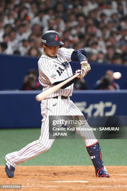 Yusuke Ohyama of Japan bats during the game one of the baseball international match between Japan And Australia at the Nagoya Dome on March 3, 2018...