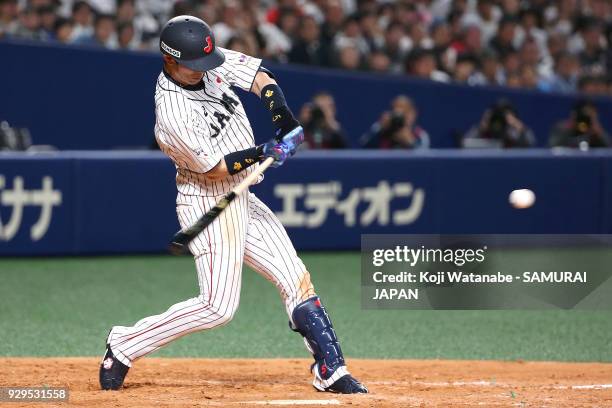 Shuta Tonosaki of Japan bats during the game one of the baseball international match between Japan And Australia at the Nagoya Dome on March 3, 2018...