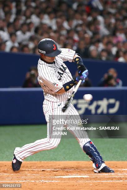 Shuta Tonosaki of Japan bats during the game one of the baseball international match between Japan And Australia at the Nagoya Dome on March 3, 2018...