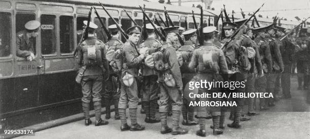 Infantry troops at Waterloo Station, London, United Kingdom, British troops departing for the continent, photograph by Sport General, World War I,...