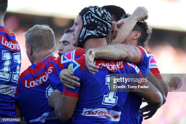 Kalyn Ponga of the Knights celebrates a try during the round one NRL match between the Newcastle Knights and the Manly Sea Eagles at McDonald Jones...