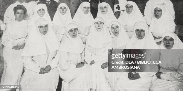 Grand Duchess Olga, 2 Alexandra Feodorovna, Empress of Russia and 3 the Grand Duchess Tatiana with the Red Cross division, Russia, World War I,...