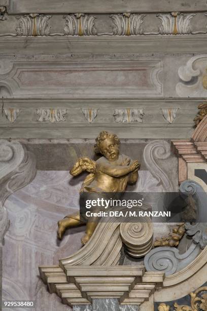 Putto, detail from the main altar , Oratory of Santa Maria delle Grazie, Parma, Emilia-Romagna, Italy, 17th century.