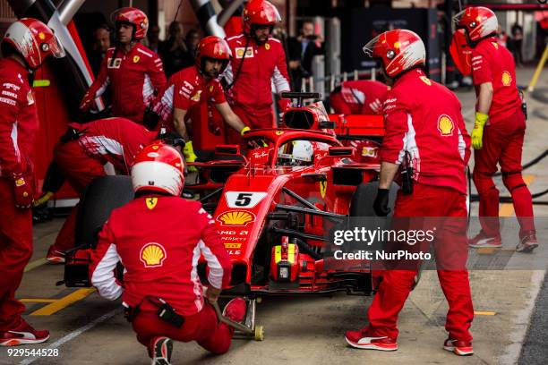 Sebastian Vettel from Germany with Scuderia Ferrari SF71H doing pit stops during day three of F1 Winter Testing at Circuit de Catalunya on March 8,...