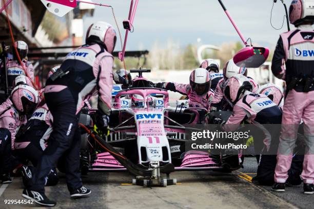 Sergio Perez from Mexico with Force India F1 VJM11 practicing pit stops during day three of F1 Winter Testing at Circuit de Catalunya on March 8,...