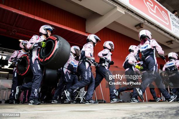 Sergio Perez from Mexico with Force India F1 VJM11 practicing pit stops during day three of F1 Winter Testing at Circuit de Catalunya on March 8,...