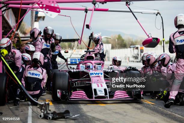 Sergio Perez from Mexico with Force India F1 VJM11 practicing pit stops during day three of F1 Winter Testing at Circuit de Catalunya on March 8,...