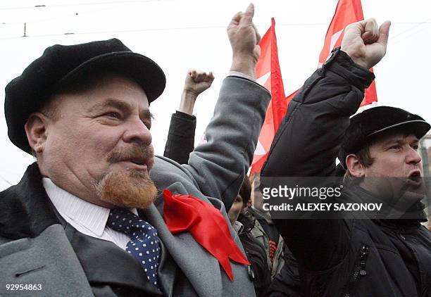 Man dressed as Soviet leader Vladimir Lenin takes part in a march in Moscow on November 7 marking the 92th anniversary of Vladimir Lenin's overthrow...