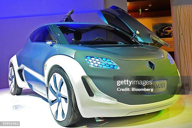 Renault SA Zoe Z.E. Concept electric automobile sits on display at a showroom in Paris, France, on Tuesday, Nov. 10, 2009. France aims to produce 2...