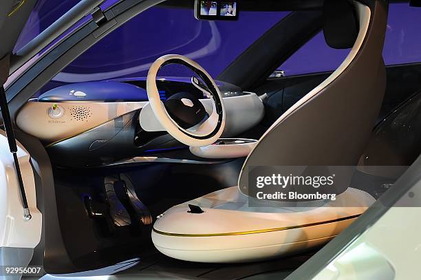 The interior of a Renault SA Zoe Z.E. Concept electric automobile is seen at a showroom in Paris, France, on Tuesday, Nov. 10, 2009. France aims to...