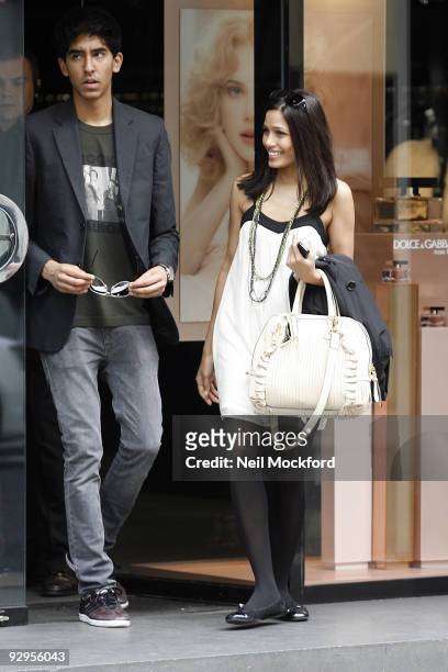 Dev Patel & Freida Pinto go Shopping at Dolce & Gabbana on September 21, 2009 in London, England.
