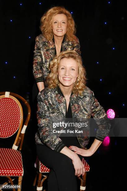 Actress Alexandra Lamy poses with her wax statue during Alexandra Lamy waxwork unveiling at Musee Grevin on March 8, 2018 in Paris, France.