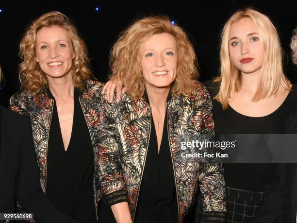 Actress Alexandra Lamy, her wax statue and her daughter Chloe Jouannet attend Alexandra Lamy waxwork unveiling at Musee Grevin on March 8, 2018 in...