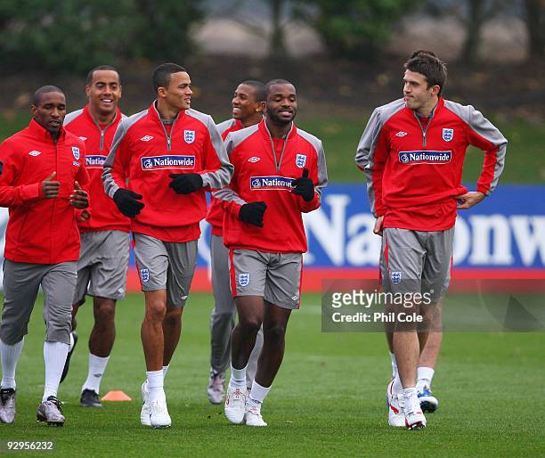 Jermain Defoe, Tom Huddlestone, Jermaine Jenas, Ashley Young, Darren Bent and Michael Carrick of England warm up during a training session at London...