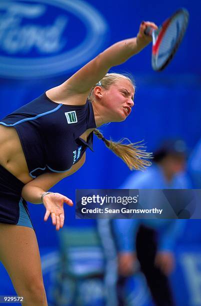 Jelena Dokic of Yugoslavia in action against Cara Black and Kevin Ullyett of Zimbabwe, during the ninth day of the Australian Open Tennis...